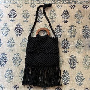 Black, woven Danielle Nicole bag